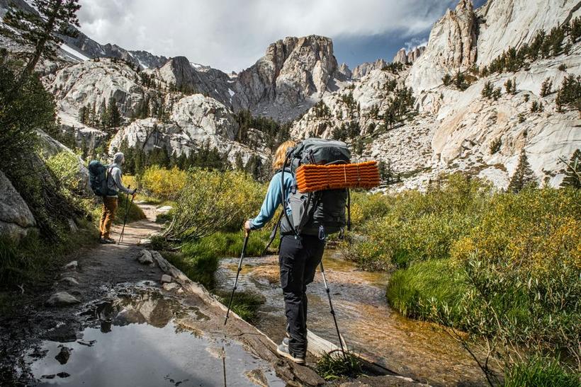 Two backpackers on the trail below Mount Whitney